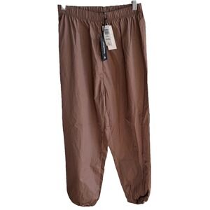 Aritzia TNA TnAction Windbreaker Jogger Track Pants Baggy Taupe Womens XS NWT